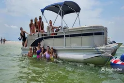 Big Comfy Roomy 24 tritoon w quad loungers & 200 HP