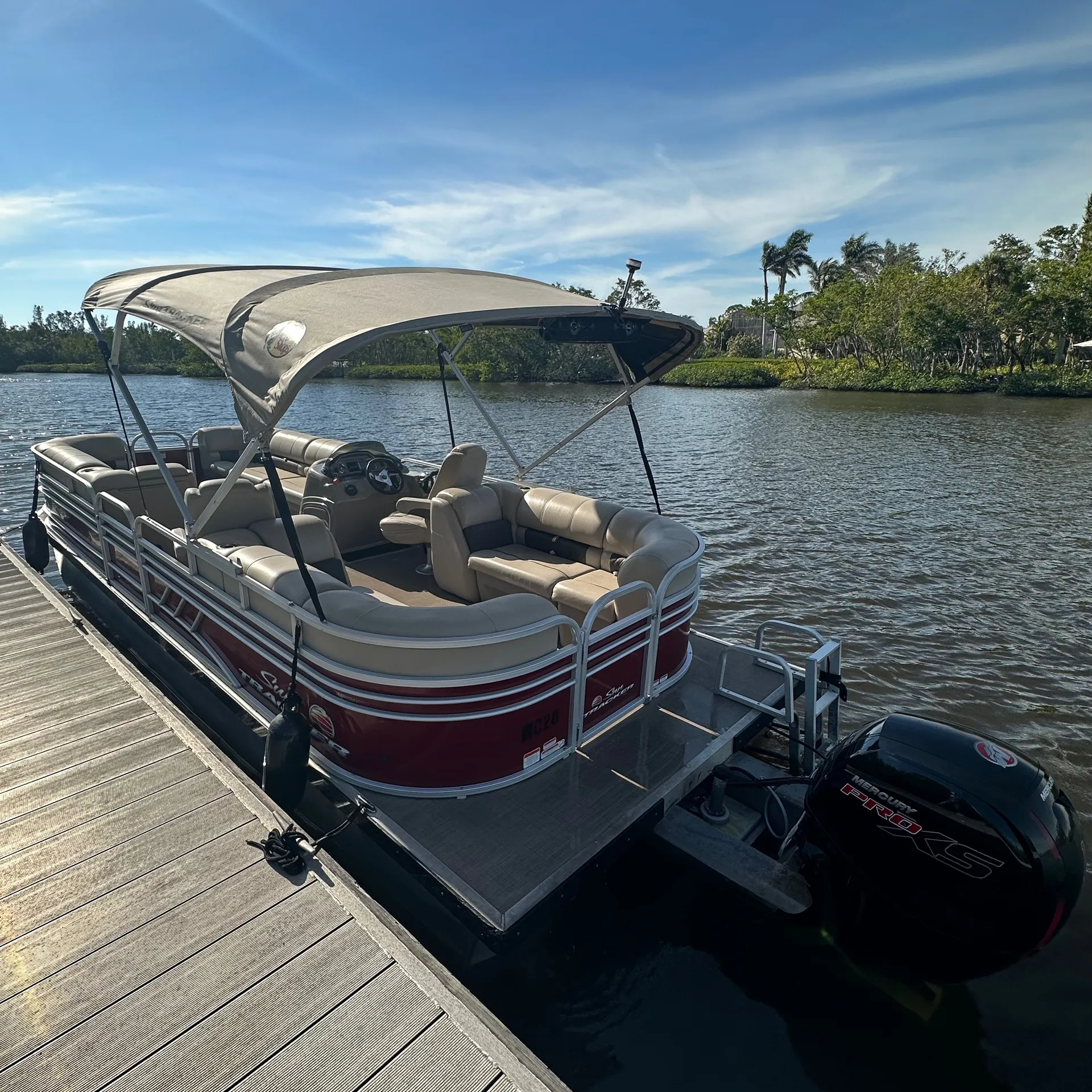 Enjoy A Relaxing Day On The Sun Tracker 24DLX Pontoon 150HP Outboard!