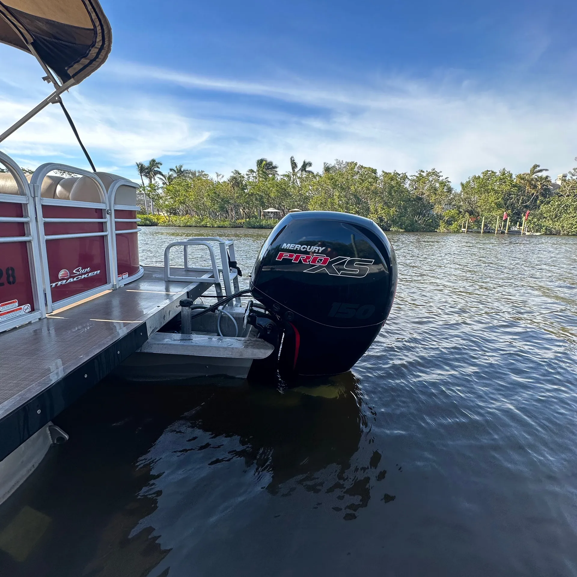 Enjoy A Relaxing Day On The Sun Tracker 24DLX Pontoon 150HP Outboard!