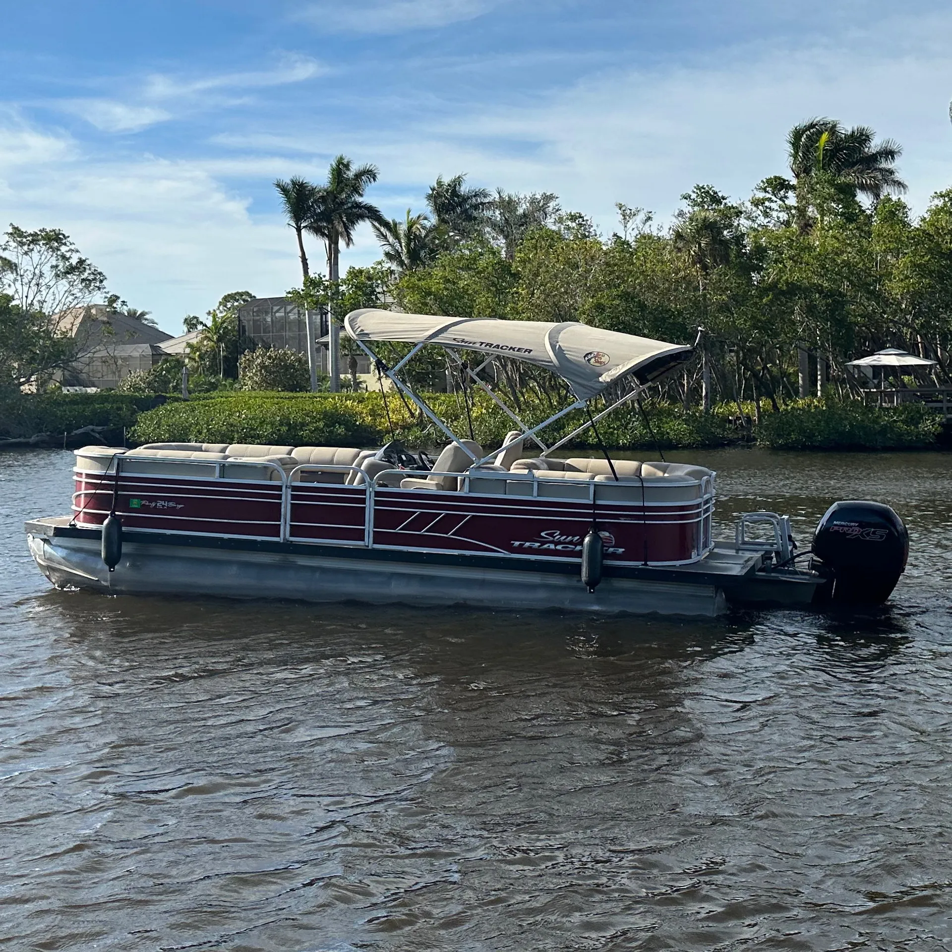 Enjoy A Relaxing Day On The Sun Tracker 24DLX Pontoon 150HP Outboard!