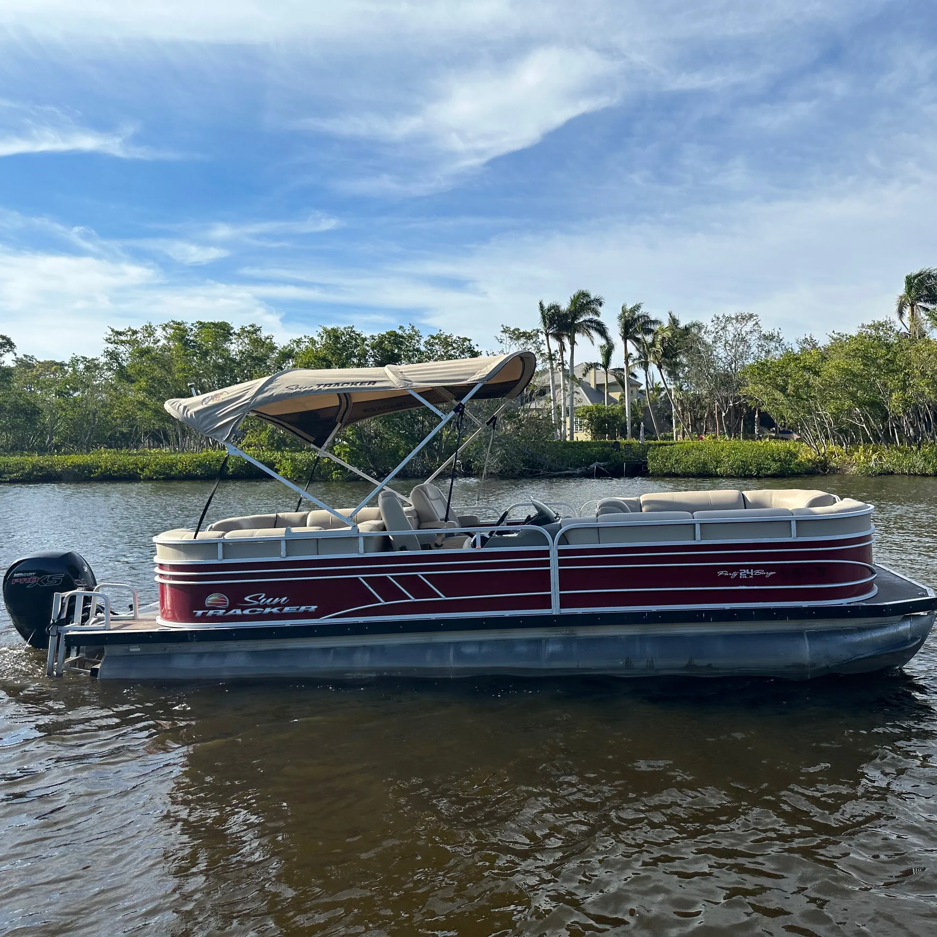Enjoy A Relaxing Day On The Sun Tracker 24DLX Pontoon 150HP Outboard!