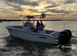 Escape on our 23.5’ Captained Comfortable Center Console 