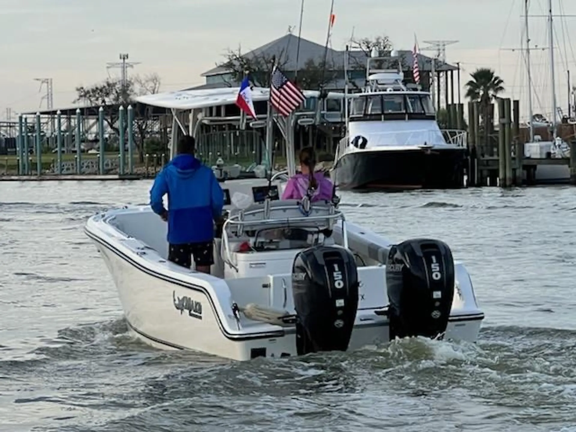 Escape on our 23.5’ Captained Comfortable Center Console 