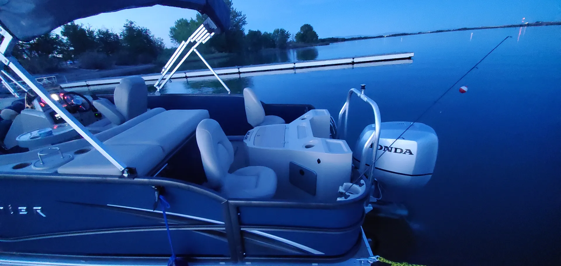 Don't worry we will dock it for you! Premier Gemini Tritoon Gas Inclu