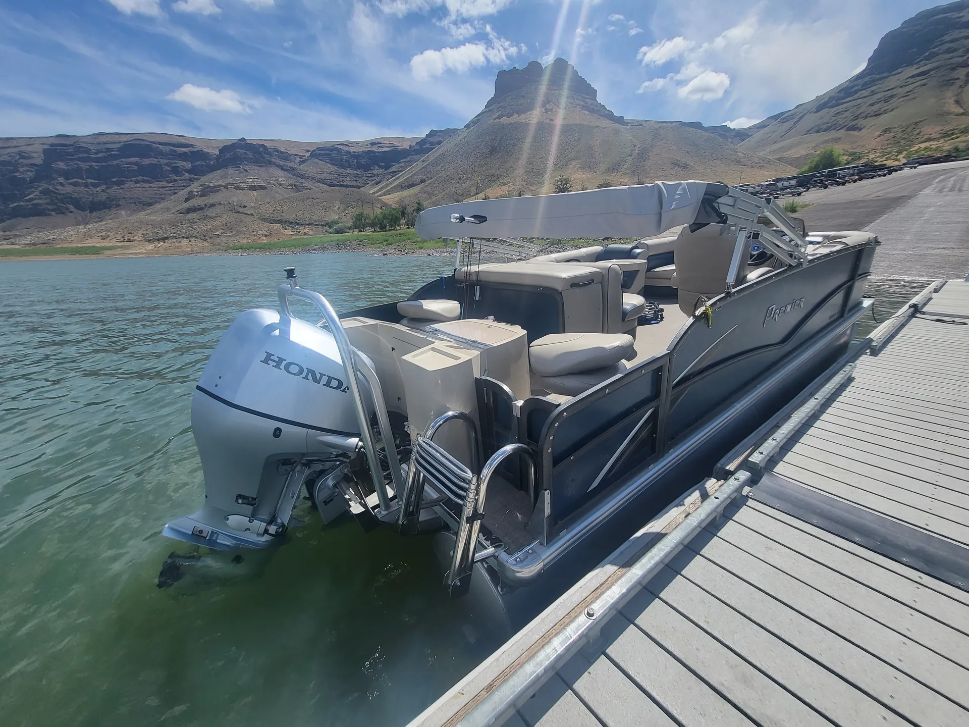 Don't worry we will dock it for you! Premier Gemini Tritoon Gas Inclu