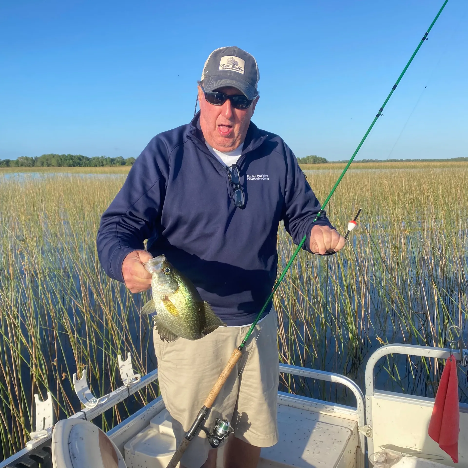 Sun Tracker Fishing Pontoon w/75HP, on Lake Istokpoga