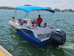 Island hop or just cruise around in this awesome Starcraft deck boat!