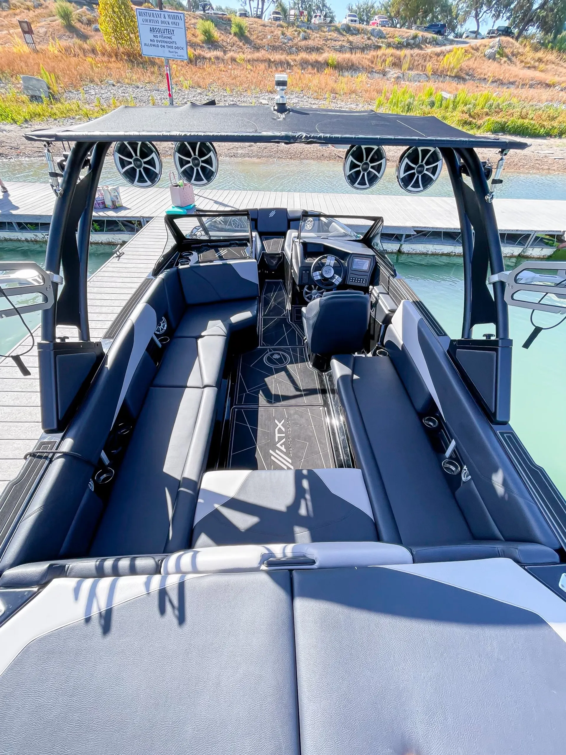 Premier 24ft Luxury Wake Surf Boat on Lake Conroe - the Black Swan