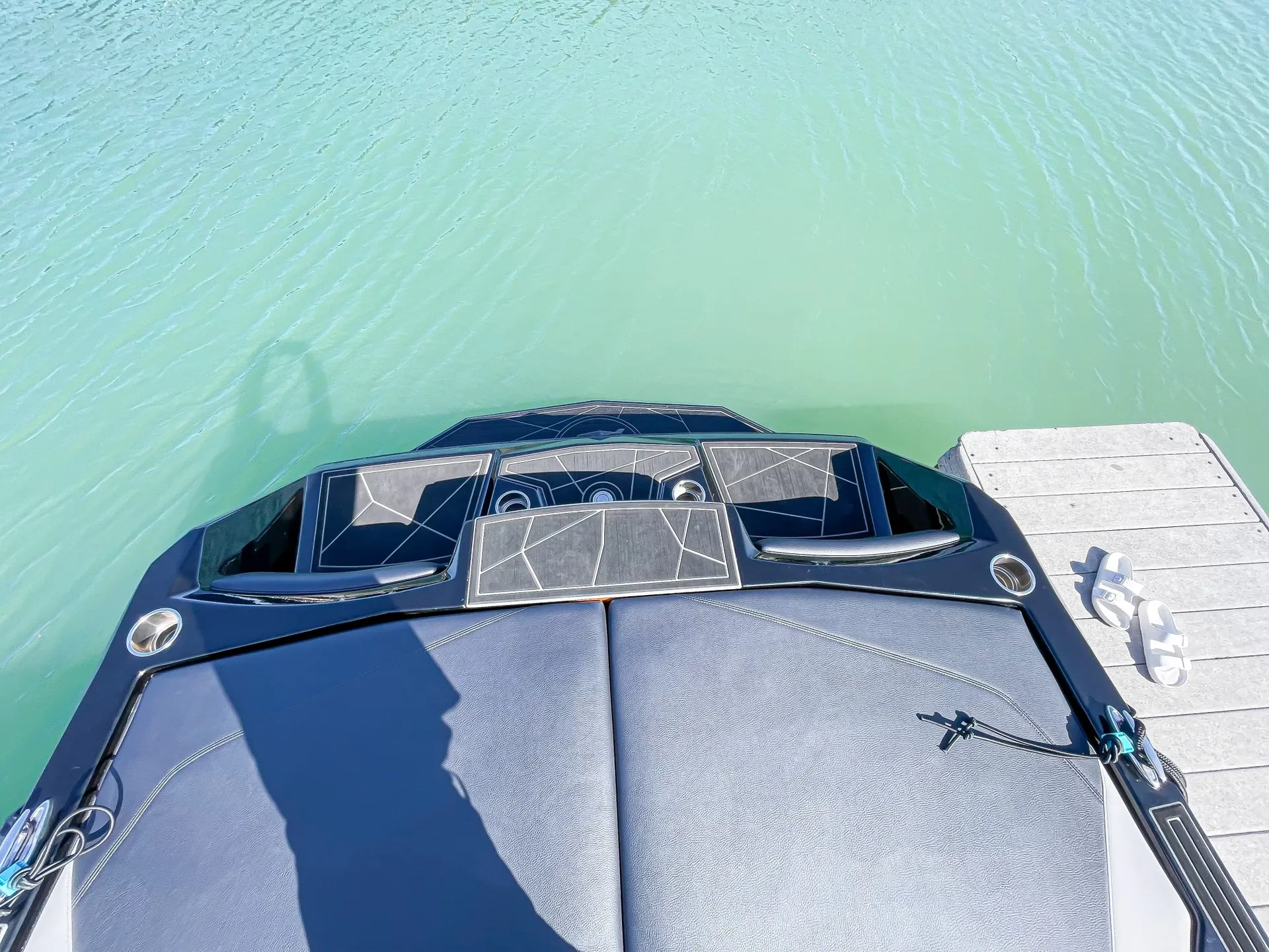 Premier 24ft Luxury Wake Surf Boat on Lake Conroe - the Black Swan