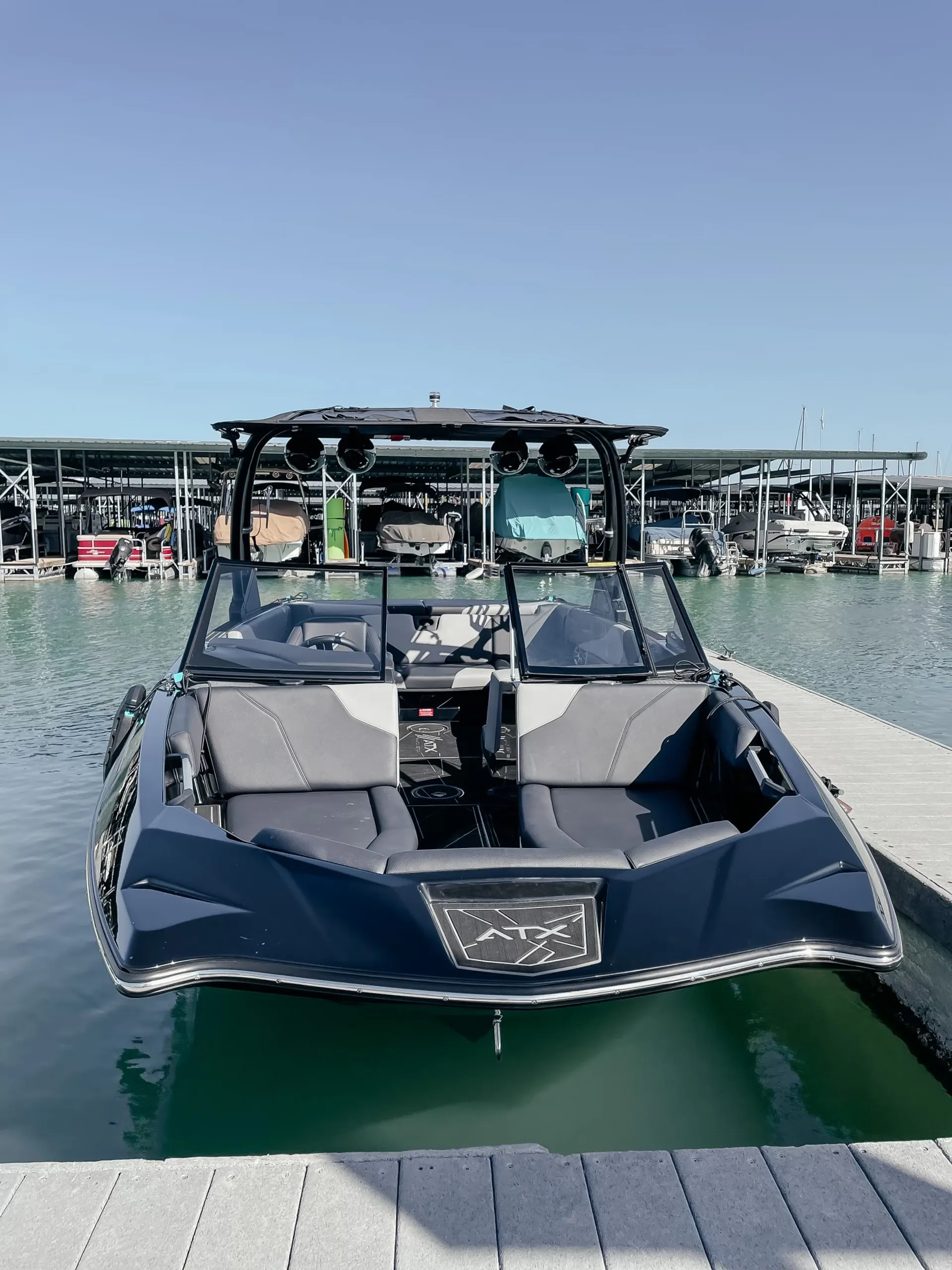 Premier 24ft Luxury Wake Surf Boat on Lake Conroe - the Black Swan