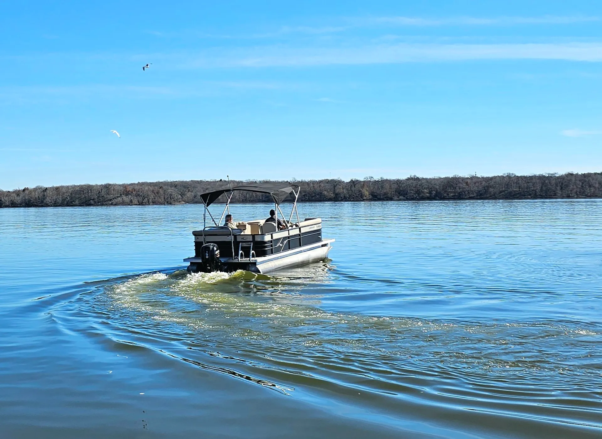 23' Tritoon on lake of your choice!