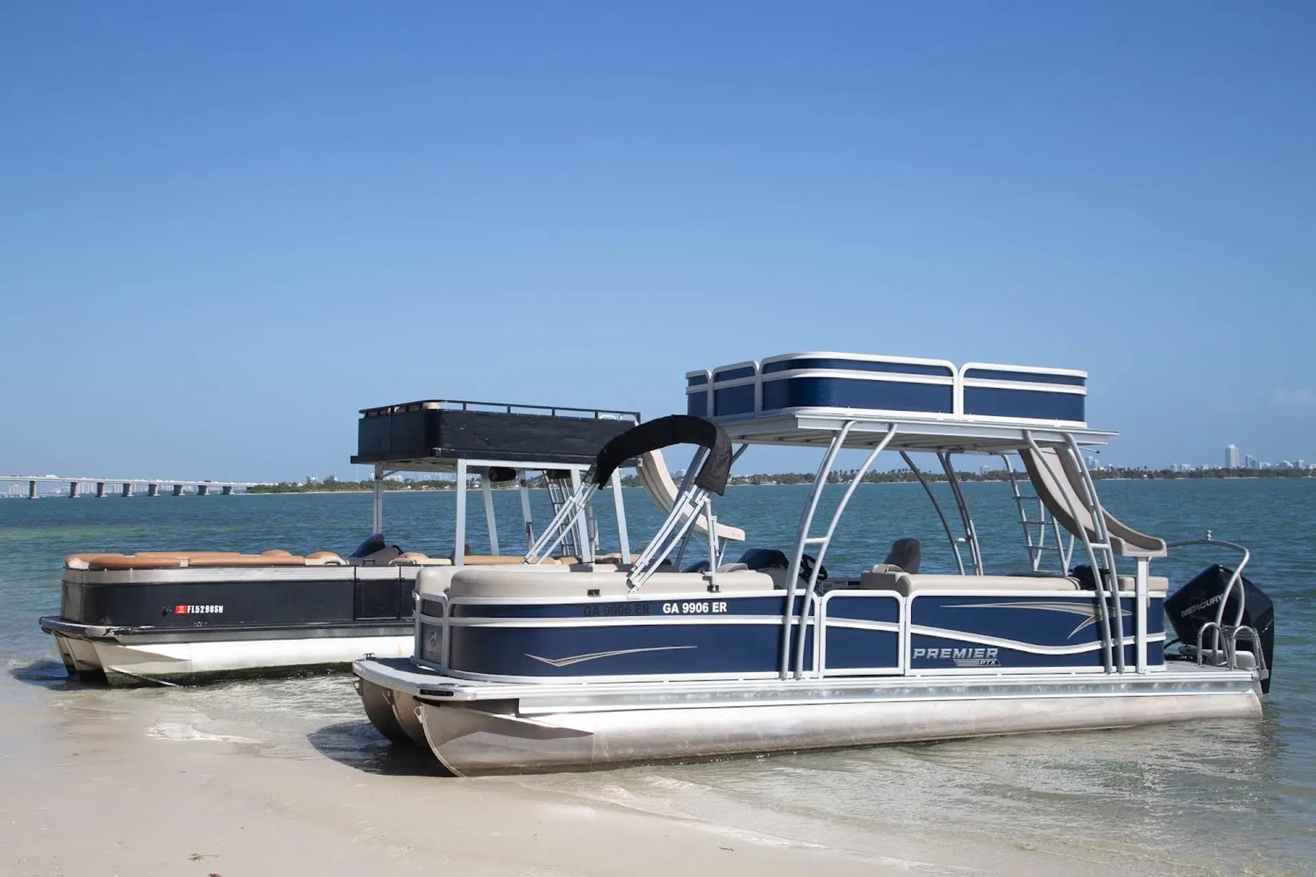 We Have Three27ft Double Deck Tritoons with Slide and Upperdeck Lounge