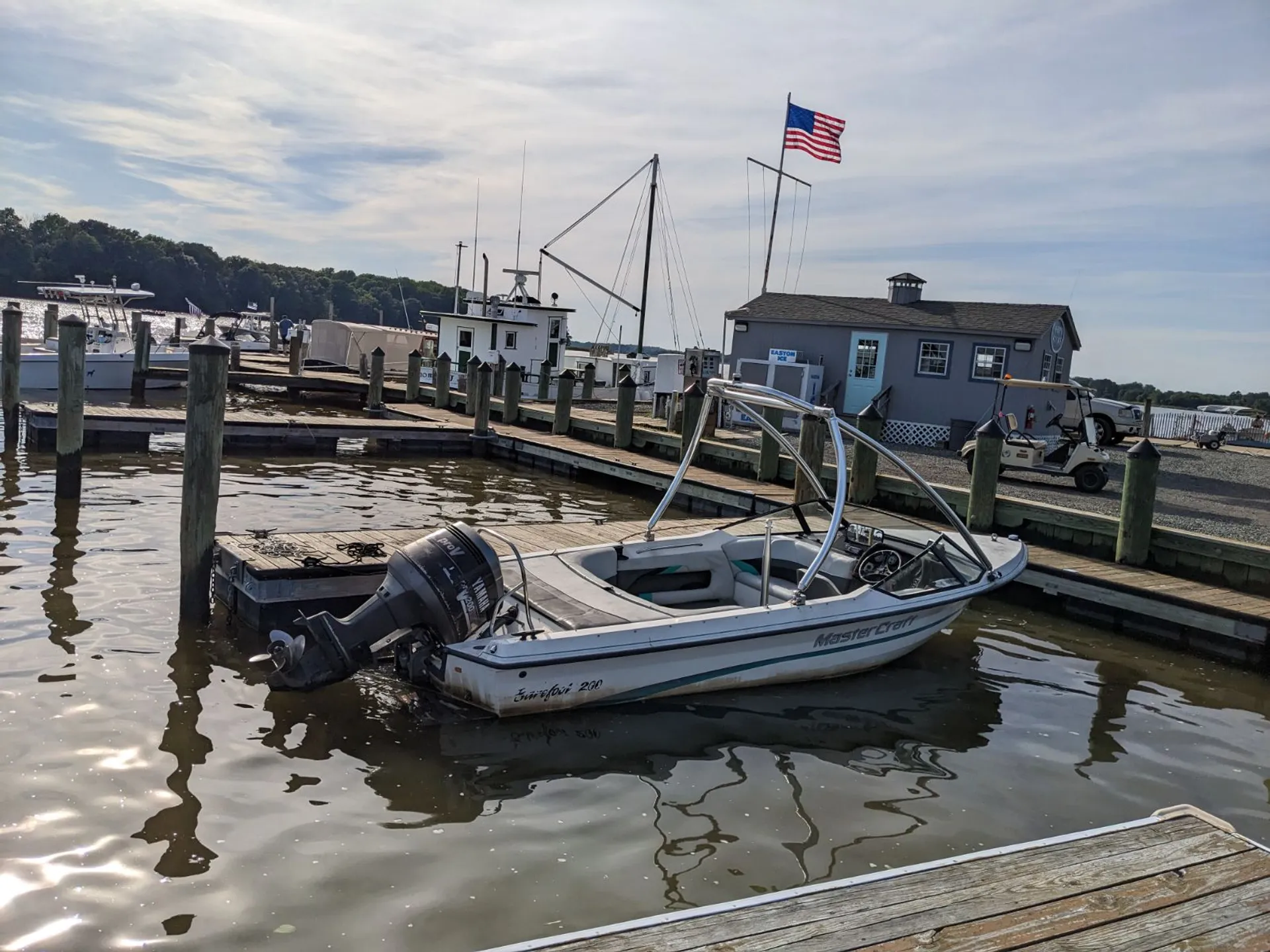 Ski boat with wakeboard tower