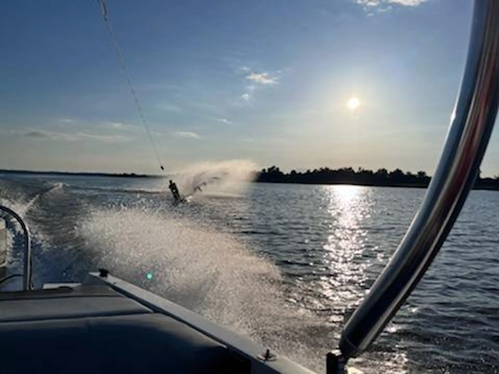 Ski boat with wakeboard tower
