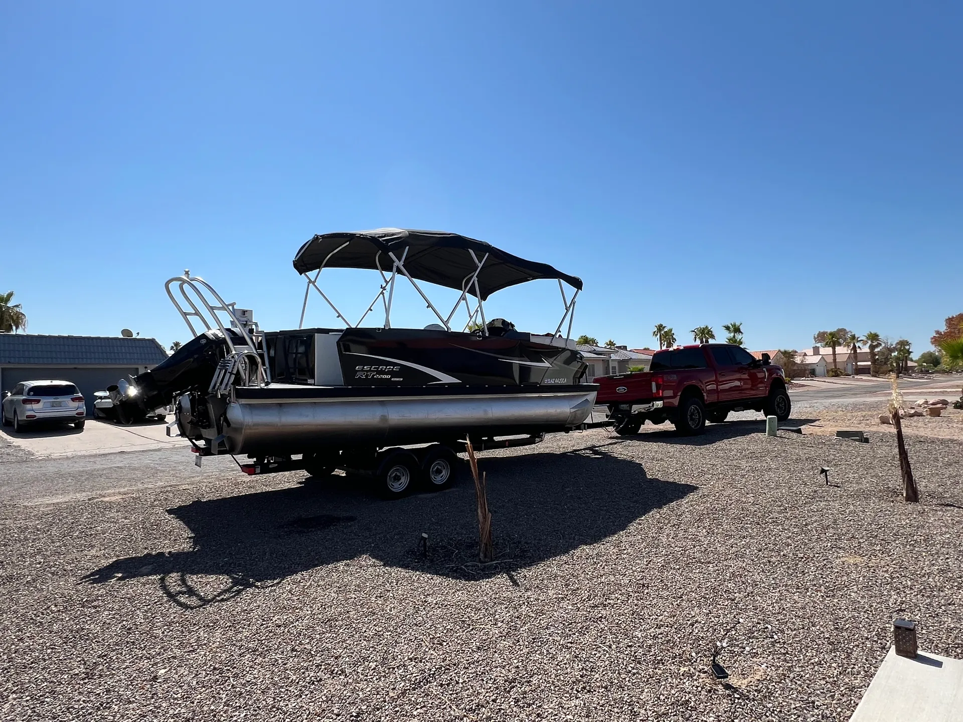 SPACIOUS 22FT TRITOON WITH BIG 200 HP MERCURY &amp; lILYPAD DIVING BOARD