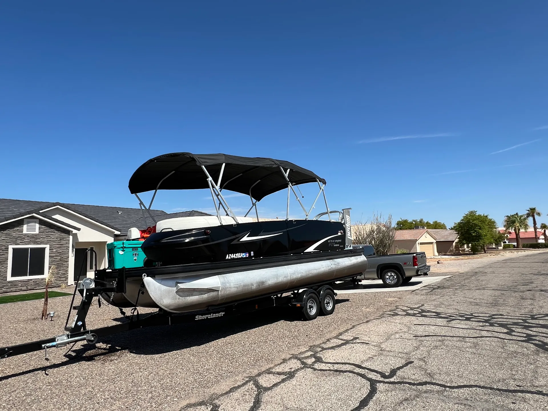 SPACIOUS 22FT TRITOON WITH BIG 200 HP MERCURY &amp; lILYPAD DIVING BOARD
