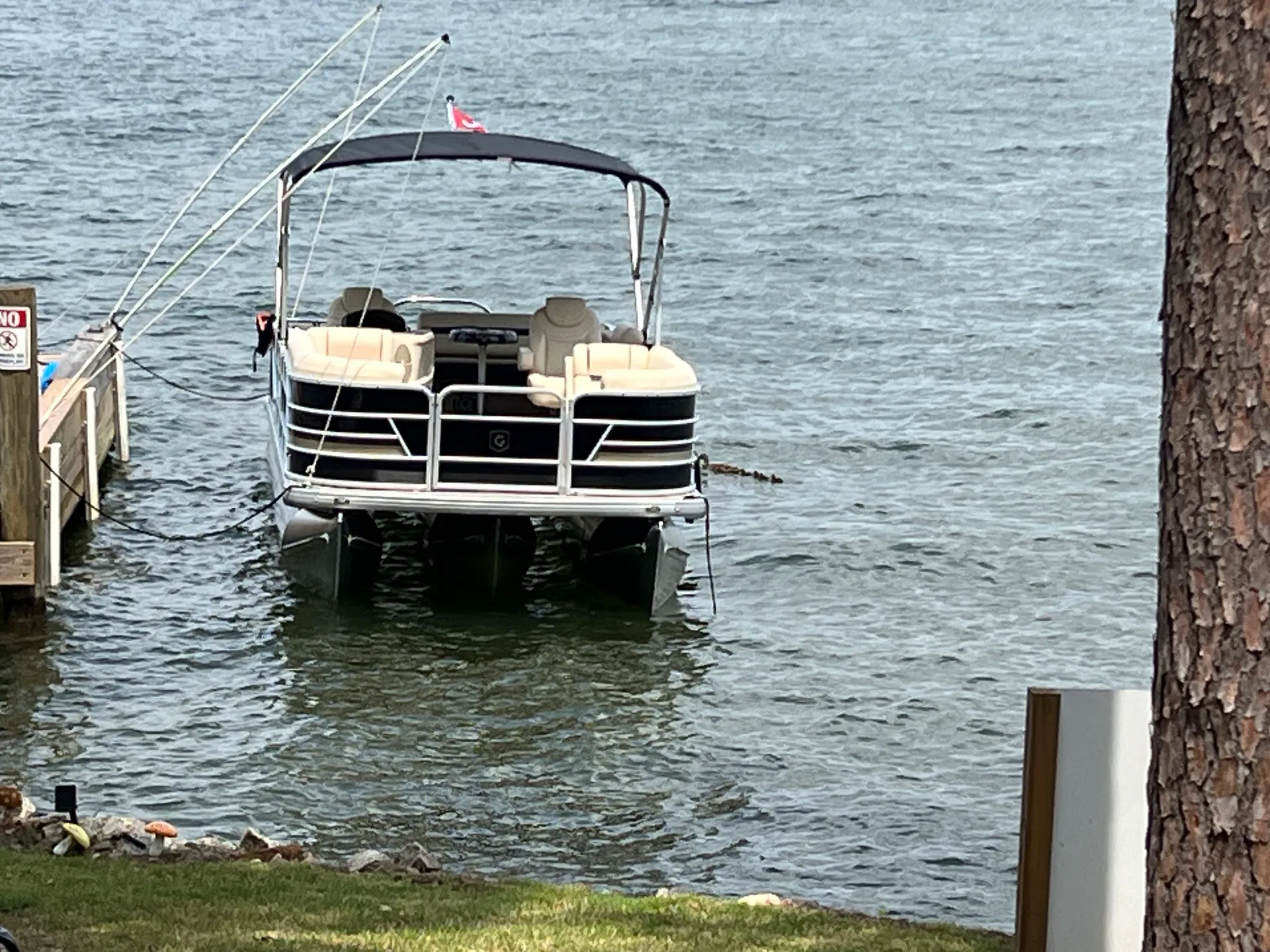 Enjoy beautiful Lake Martin on this 23ft Godfrey Sweetwater