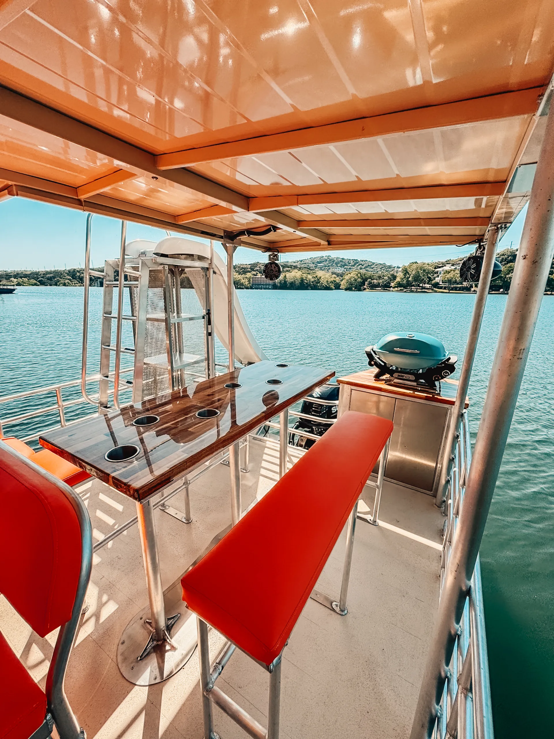 24 person Tiki Pontoon with water slide and GRILL