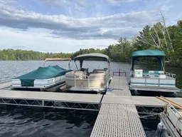 22 ft pontoon fishing boat on semi private lake