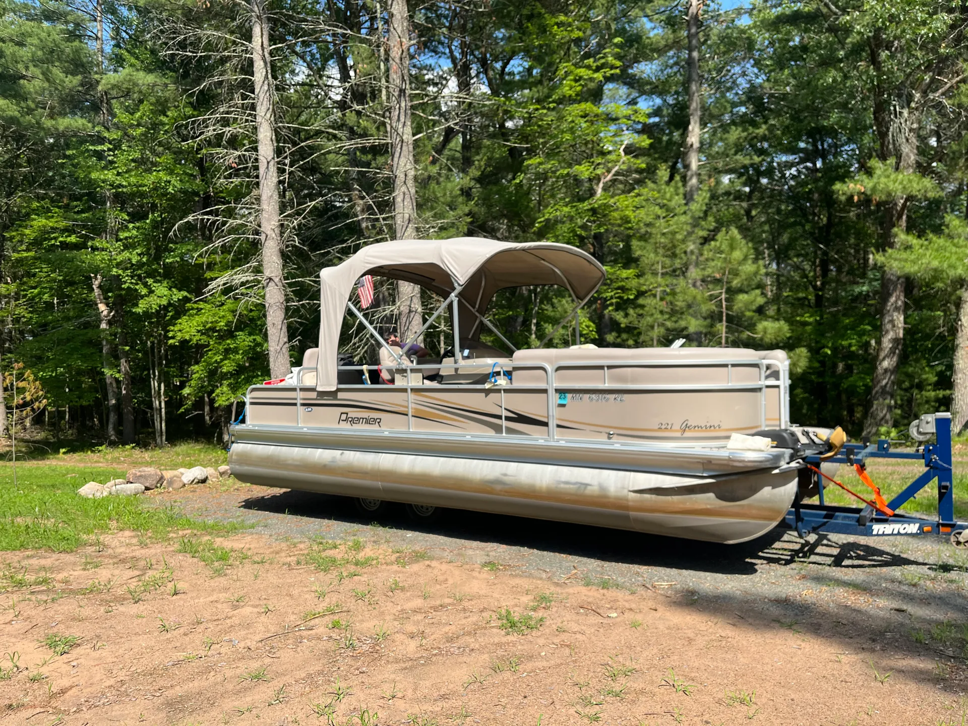 22 ft pontoon fishing boat on semi private lake