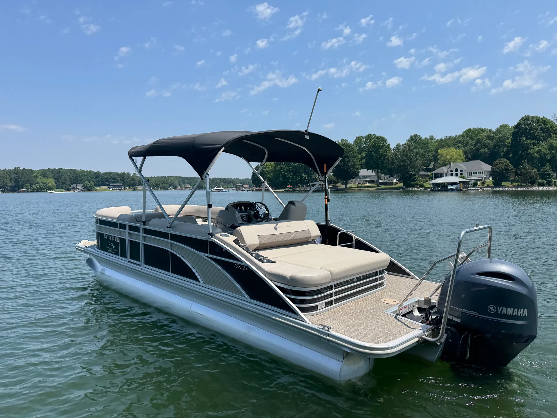 Tube and Cruise Lake Norman Luxury Bennington Tritoon Swingback 