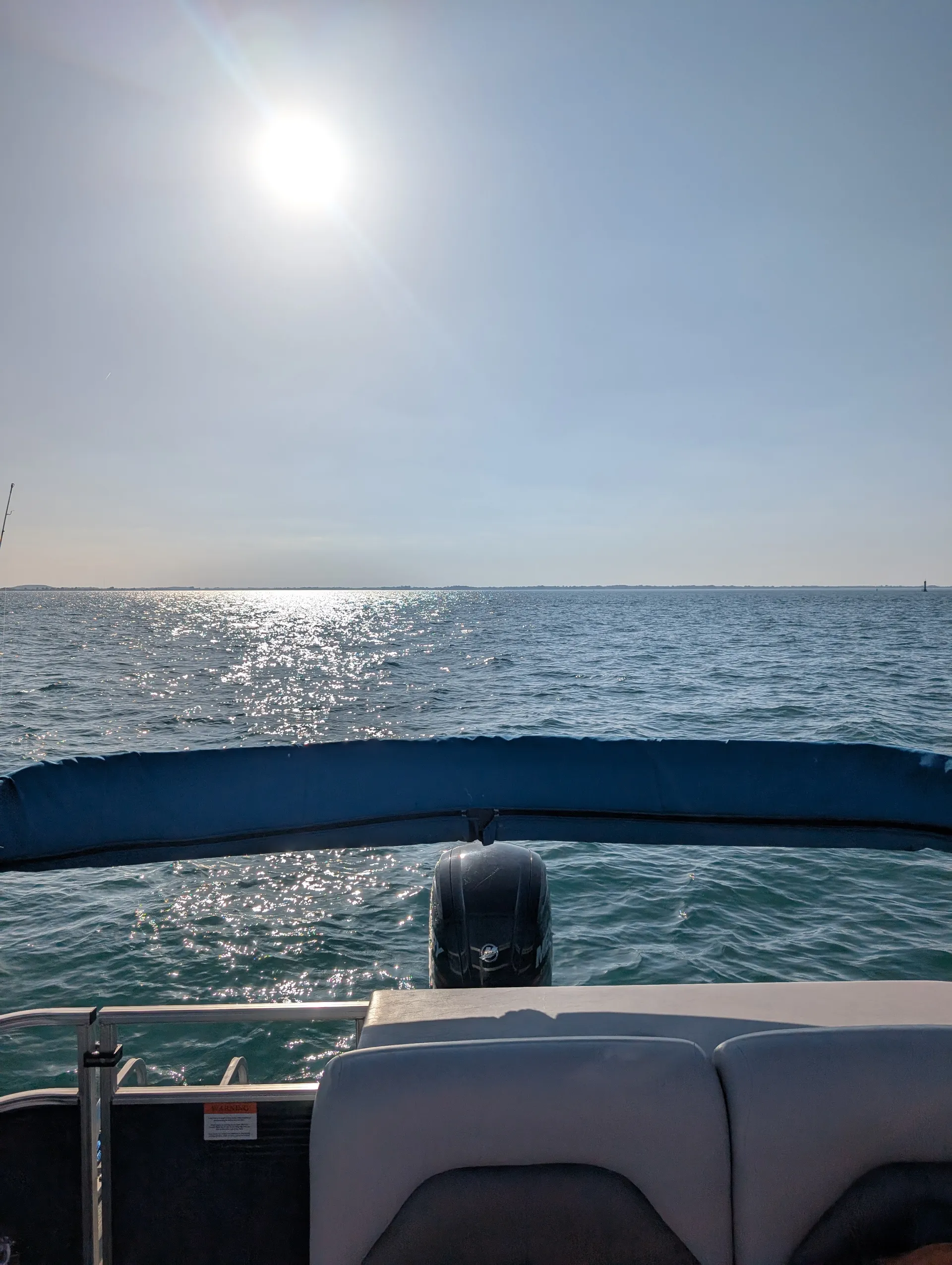 22 ft super clean pontoon boat ready to use in the Detroit River. 