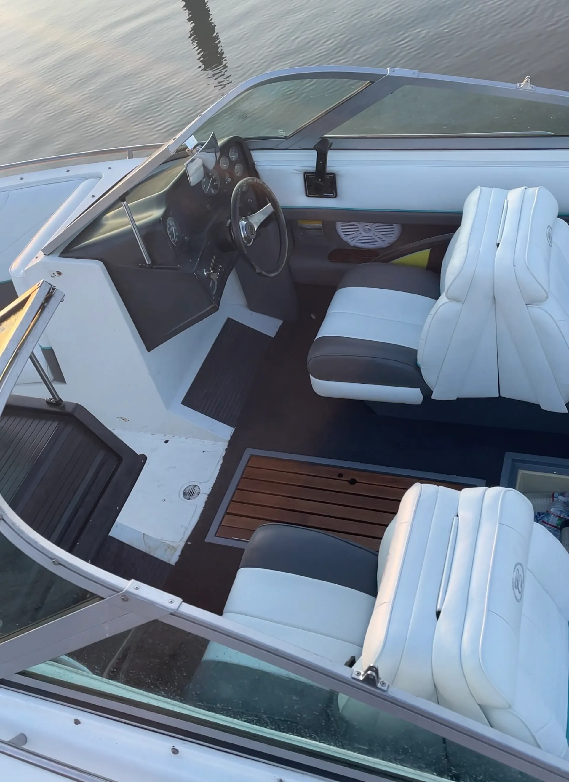 Experience the thrill of wake surfing on a classic 1989 Cobalt