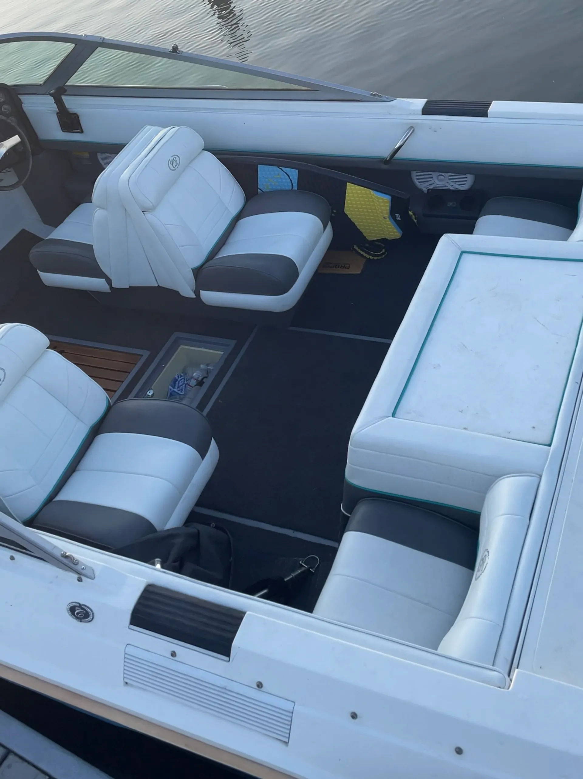 Experience the thrill of wake surfing on a classic 1989 Cobalt