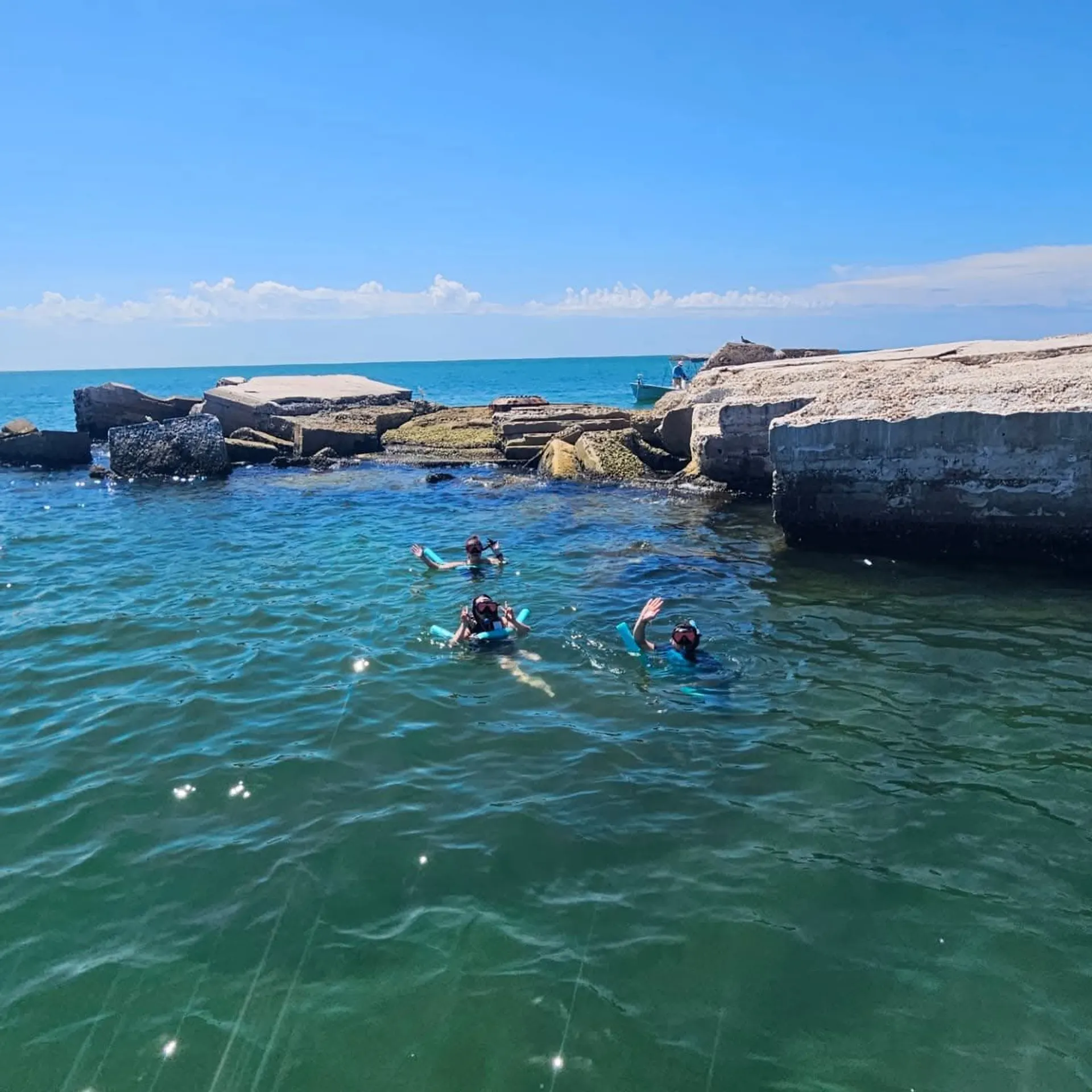 Boat tour for watersports, snorkeling, shelling, dolphins and sunsets 