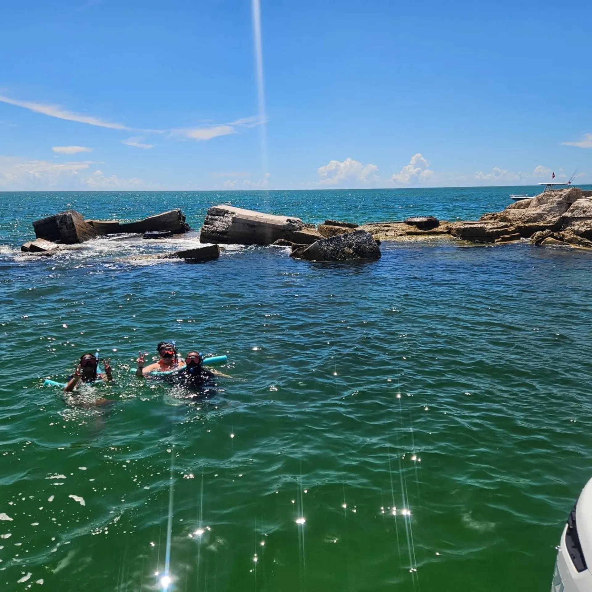 Boat tour for watersports, snorkeling, shelling, dolphins and sunsets 