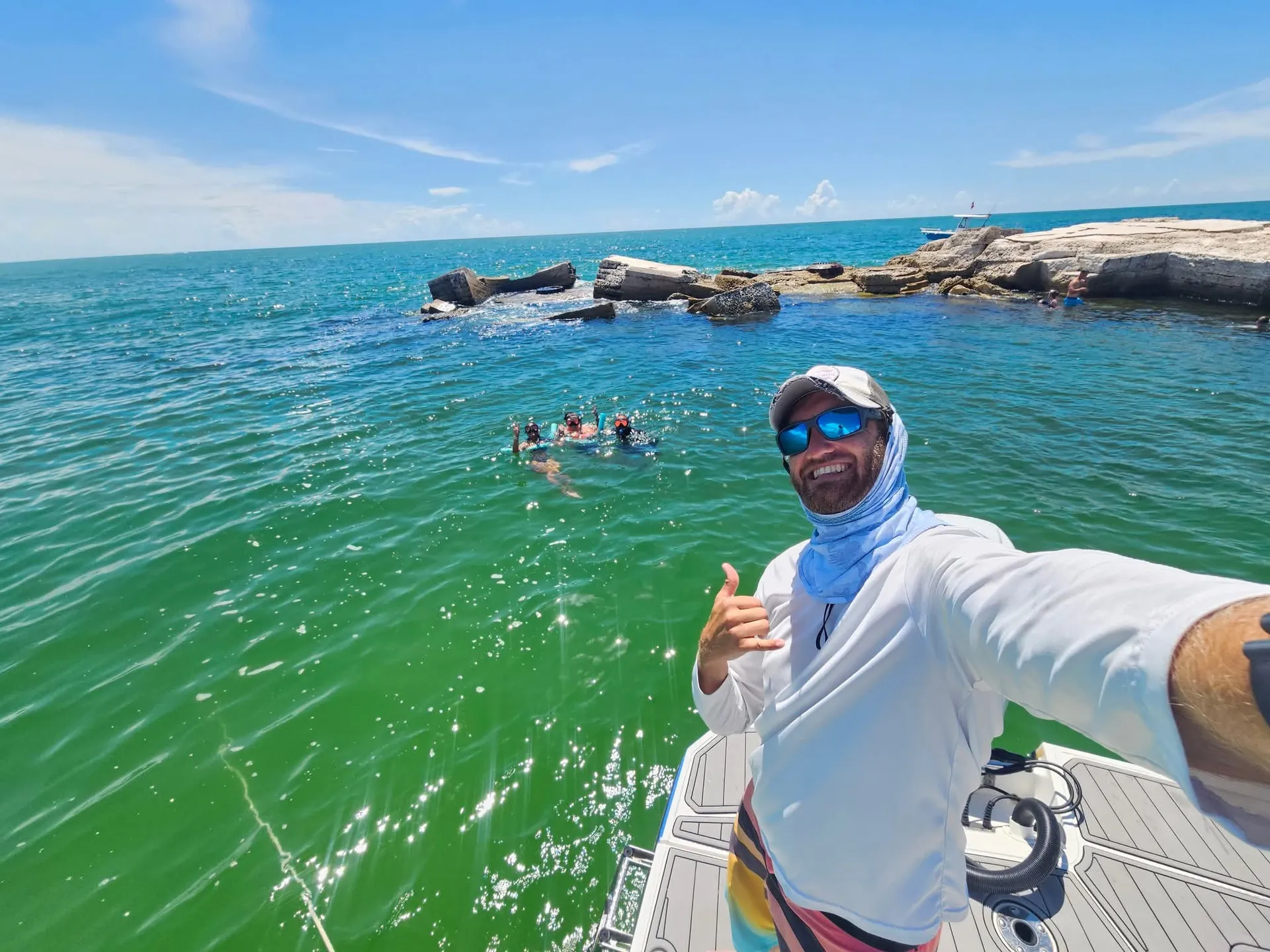 Boat tour for watersports, snorkeling, shelling, dolphins and sunsets 