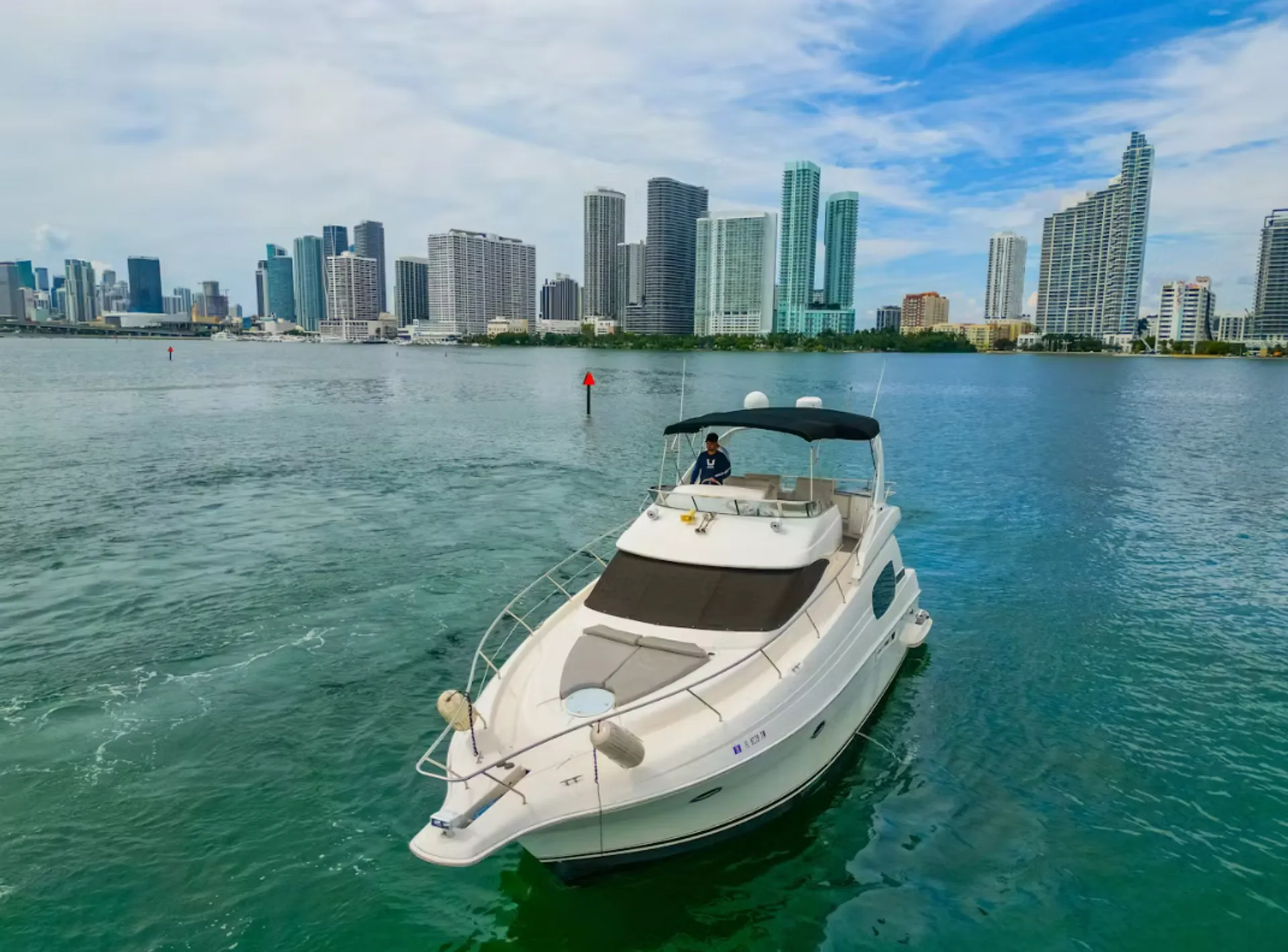 Enjoy "SANTORINI" Silverton Sport Bridge 48ft in Miami!