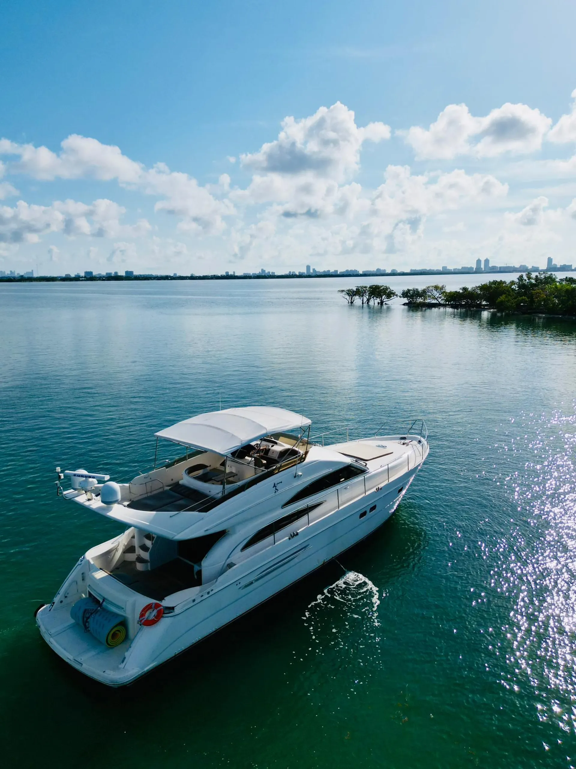 Enjoy "CANCUN" 65ft Viking Flybridge Yacht in Miami!