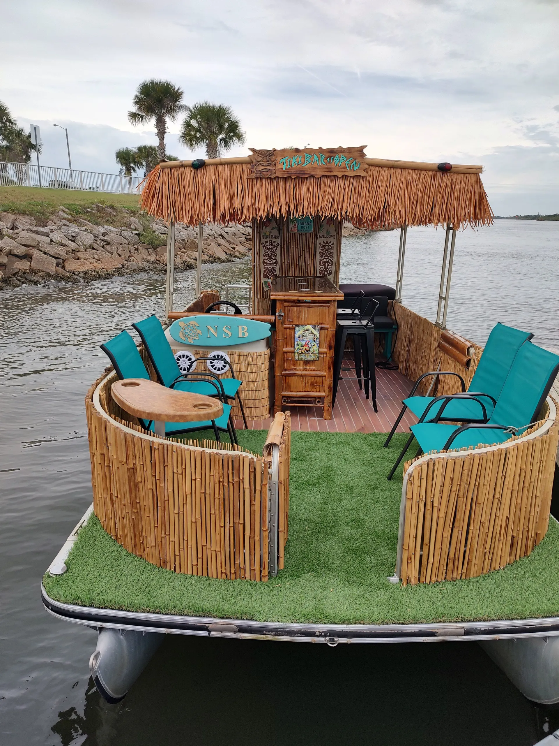 Tiki boat with bar