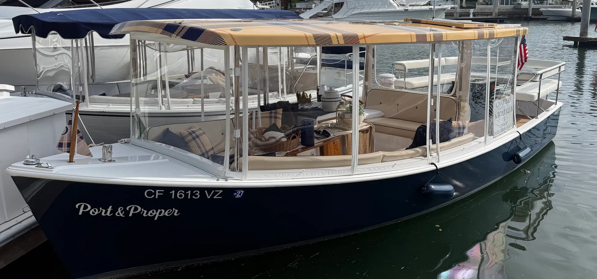 Port & Proper's Luxury Captained Duffy w/ Fire Pit &Styled Tablescape