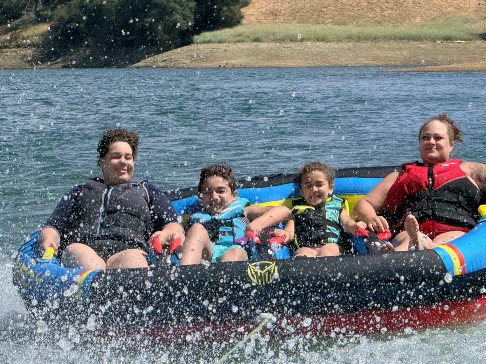 Folsom lake, tube, wake surfing, relaxing on the water