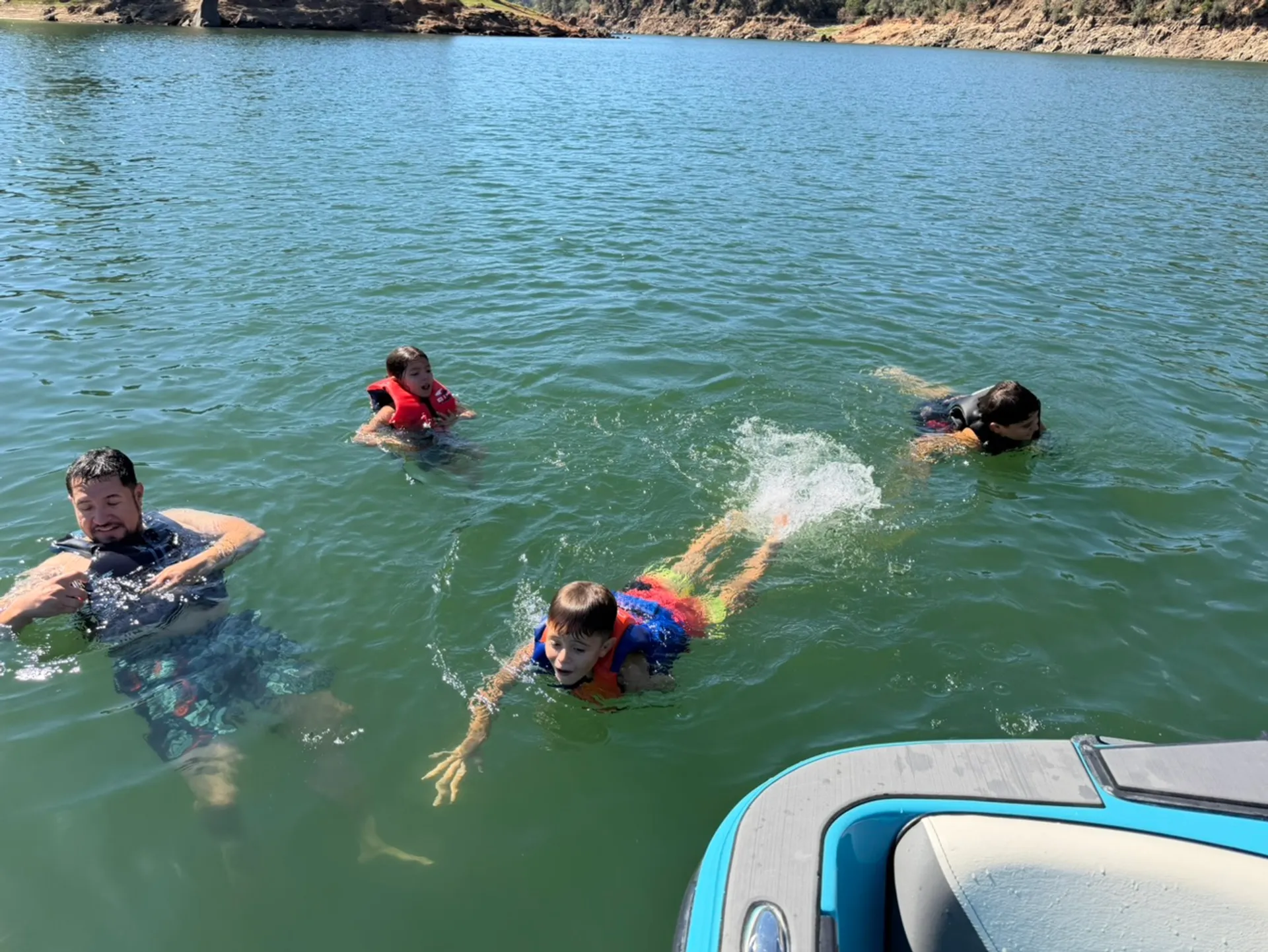 Folsom lake, tube, wake surfing, relaxing on the water