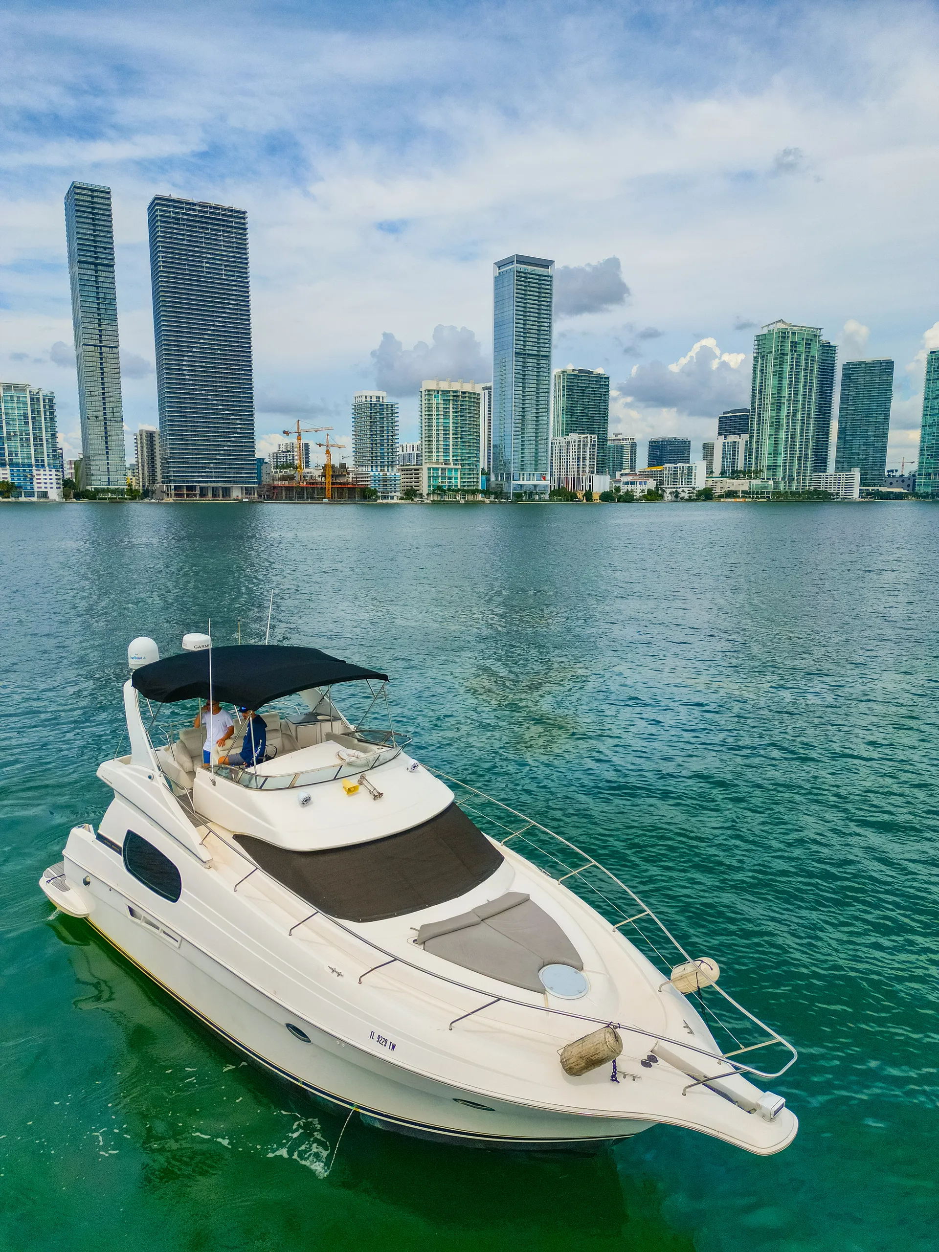 Enjoy "SANTORINI" Silverton Sport Bridge 48ft in Miami!